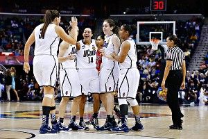Women's college basketball - Connecticut Huskies embrace target on back