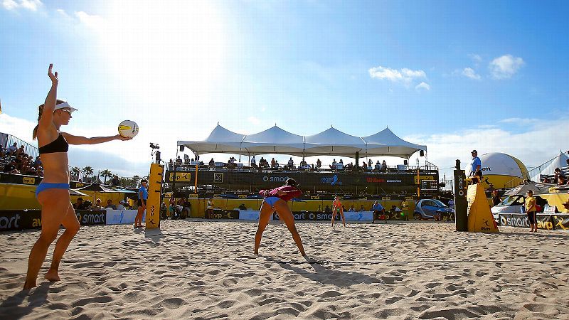 Kim DiCello serves in front of the stands at the AVP Championships at Huntington Beach on Sunday.