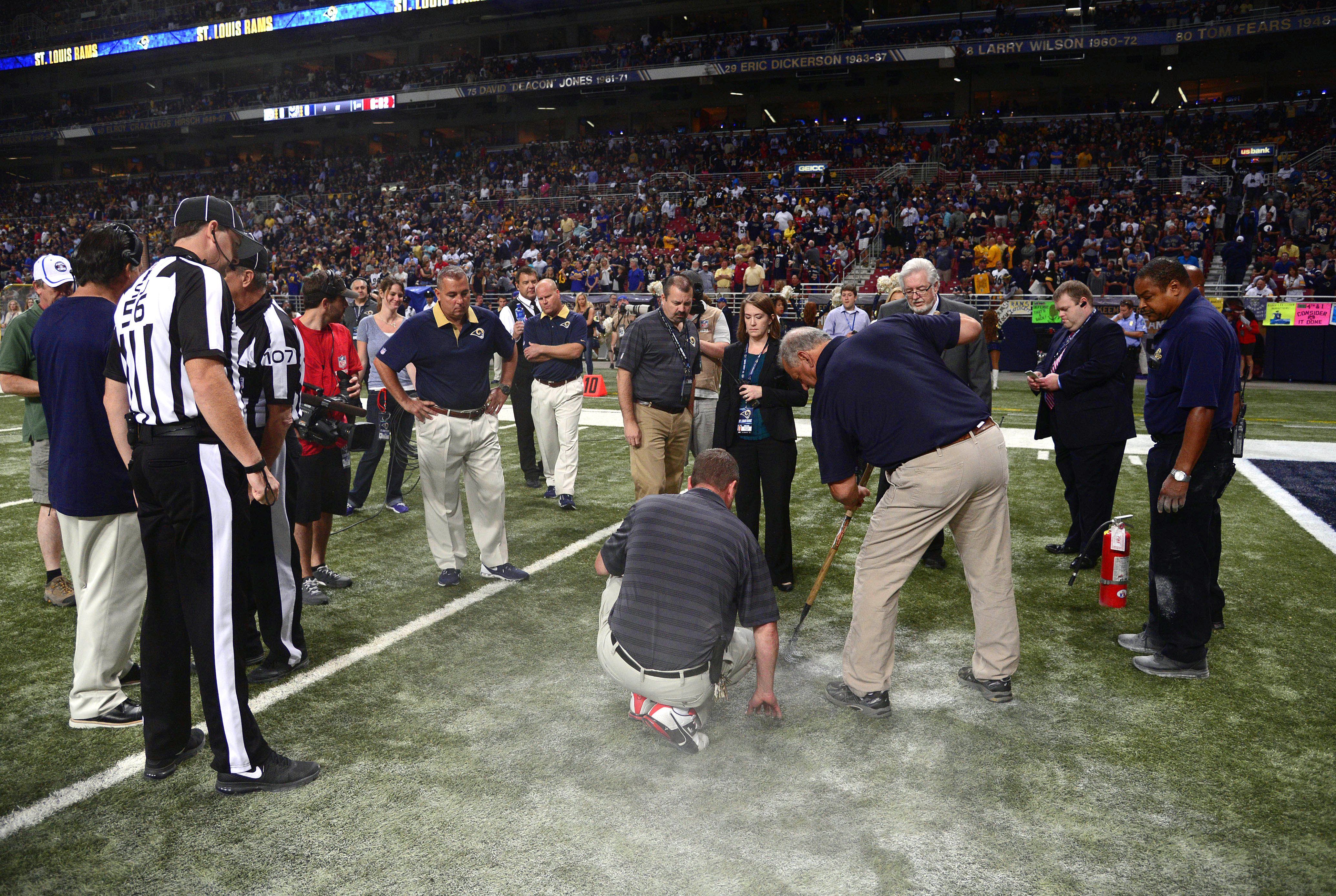 Steelers-Rams delayed after turf catches fire