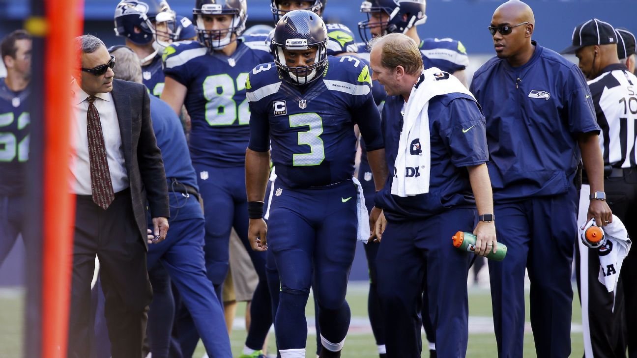 Seattle Seahawks QB Russell Wilson suffers knee injury in Sunday's game