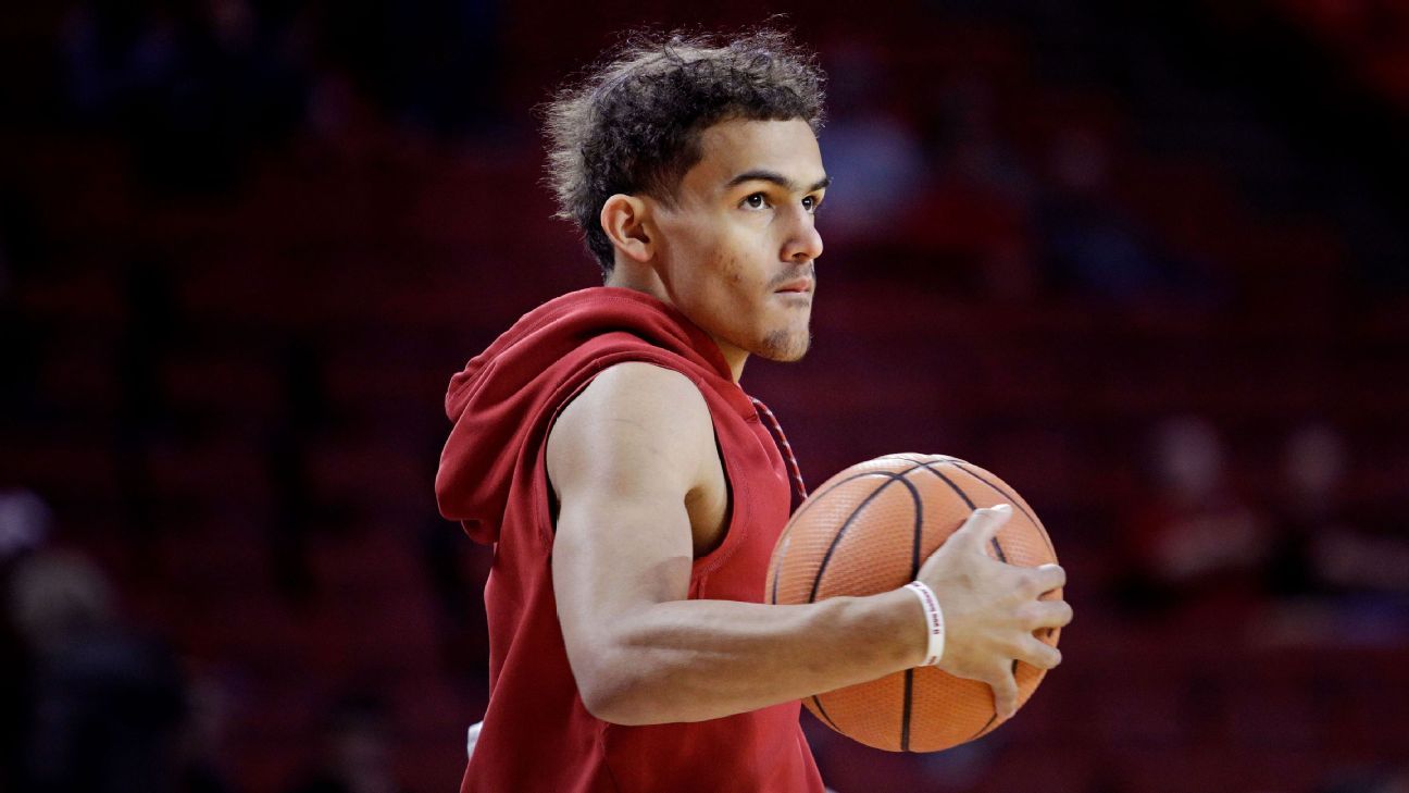 Trae Young scores 32 despite battling illness, but WVU gets win