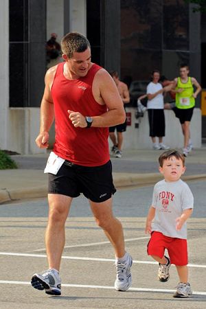 Will runs with son