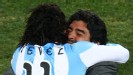 Diego Maradona hugs Carlos Tevez after his long-range strike put Argentina 3-0 ahead