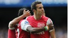 Robin Van Persie celebrates his goal for Arsenal