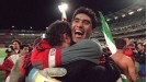 Iran goalkeeper Ahmad Reza Abedzadeh celebrates qualification after the final whistle