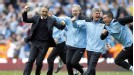 Roberto Mancini celebrates on the touchline as his Manchester City side grab a late winner