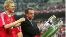 Ottmar Hitzfeld celebrates with the trophy
