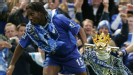 Didier Drogba parades the trophy after a fine first season