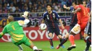 Japan laid down a World Cup qualifying marker with a comfortable 3-0 victory over Oman
