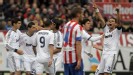 Real Madrid celebrate their leveller against Atletico