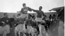 Blackpool captain Harry Johnston (left) and Stanley Matthews are carried aloft at the end of the match