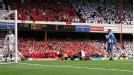 Thierry Henry kisses the turf after completing his hat-trick