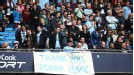 Man City fans display a banner in support of their sacked manager, Roberto Mancini