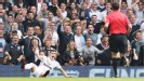 Gareth Bale and the Spurs fans are in shock as referee Andre Marriner turns down a penalty appeal and books the winger for diving