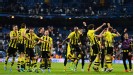 Borussia Dortmund celebrate after holding on against Real Madrid's late onslaught to make the Champions League final