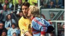 A match with bite: Oliver Kahn 'nibbles' Heiko Herrlich 