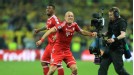 Arjen Robben celebrates after his late goal secured victory for Bayern
