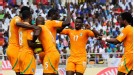 Ivory Coast celebrate one of their four goals against Tanzania