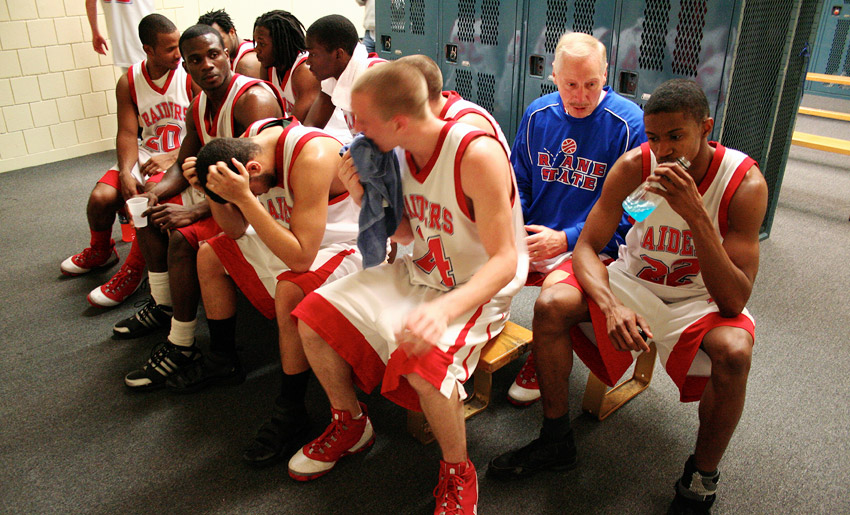Ken Mink in locker room with teammates