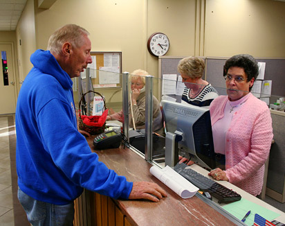 Ken Mink checking on grade