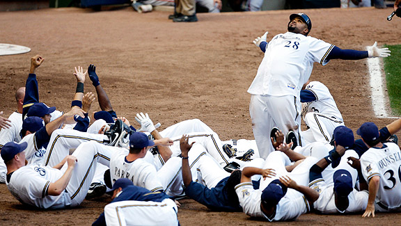 PRINCE FIELDER and teammates celebrate a walk-off HR last May.
