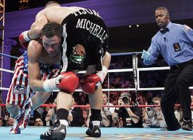 Kermit Cintron, left, and Antonio Margarito