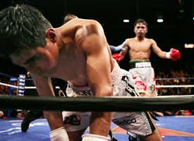 Erik Morales (foreground)/Manny Pacquiao