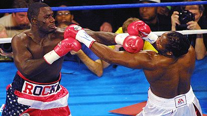 Hasim Rahman (L) and Lennox Lewis