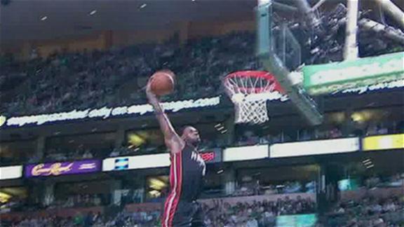 derrick rose dunks on lebron james. LeBron James dunks on the