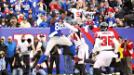 Eli Manning lanz� este domingo tres pases de touchdown, y los New York Giants superaron con amplitud a los Atlanta Falcons para vencerlos por 24-2 en la Ronda de Comodines de la Conferencia Nacional.