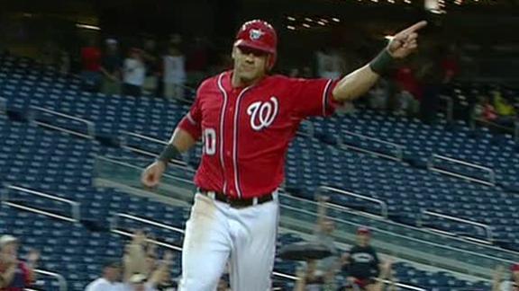 Nats rally after 2.5-hour delay, top Marlins in 10