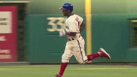 Rollins' HR helps surging Phillies sweep Marlins