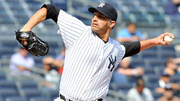 Yanks win in Pettitte's return, reclaim 1st place