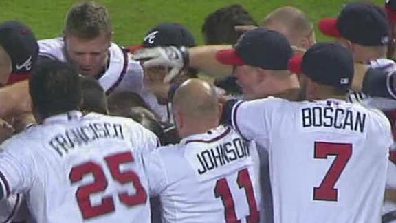 Braves clinch playoff bid on Freeman's walk-off