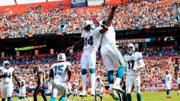 Tannehill throws 2 TDs, Dolphins hold off Rams