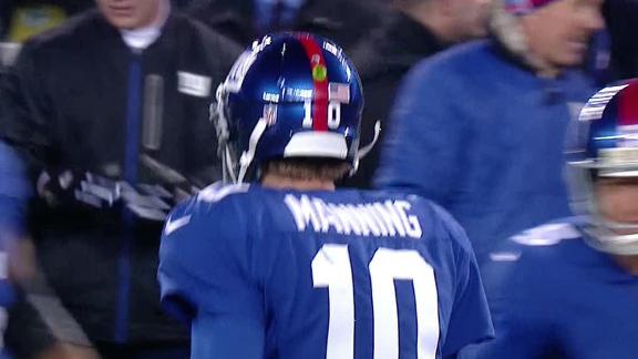 Eli, Giants end slide by sacking Rodgers, Pack