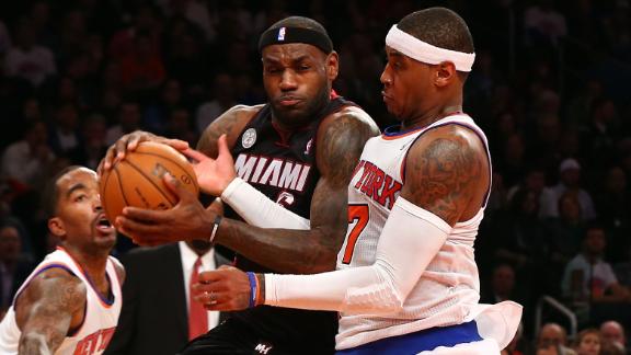 Melo-less Knicks ease by Heat behind Felton