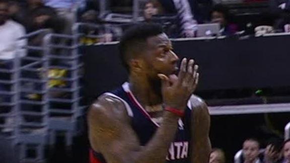 Hawks overcome Crawford, Wizards for OT win