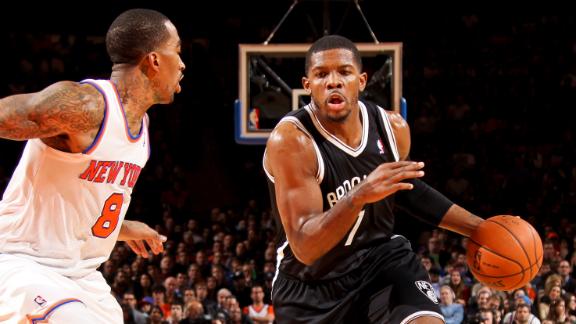 Johnson's jumper gives Nets split with Knicks