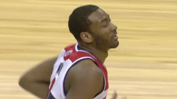 Wizards clamp down on Nets, hold on for win