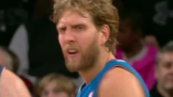 Nowitzki, Carter help Mavericks hold off Nets