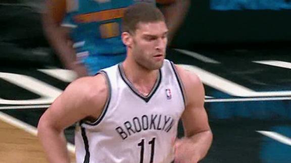 Lopez's dunk over brother highlights Nets' win