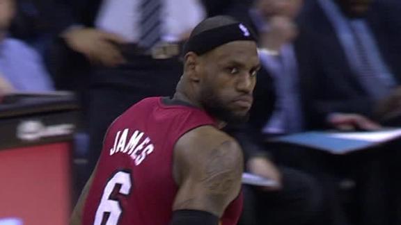 LeBron, Heat extend streak with furious rally