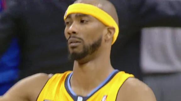 Nuggets make it 14 straight on late free throws