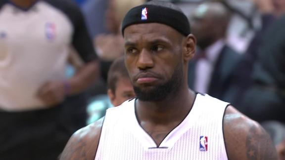 LeBron dominates as Heat extend streak to 27