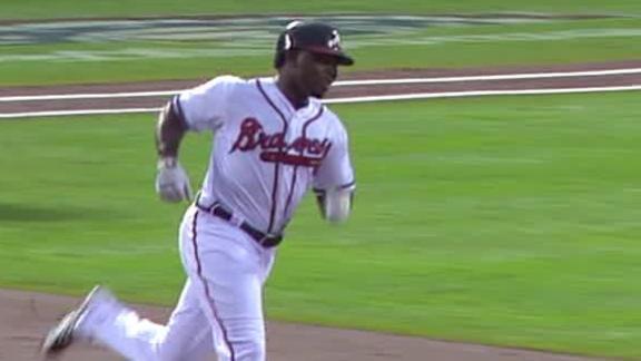 Freeman, Braves hammer Phillies' Halladay