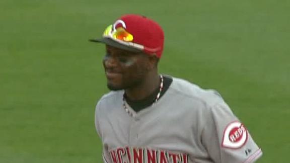 Reds snap tie, explode for nine runs in 9th