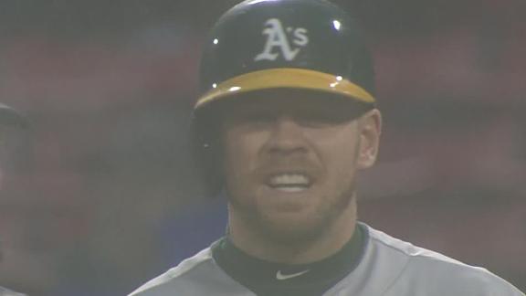 A's pound Red Sox in rain-shortened game