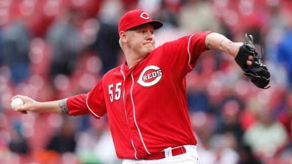 Latos stymies Cubs in finale of homestand
