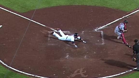Strasburg has arm issue in loss to Braves